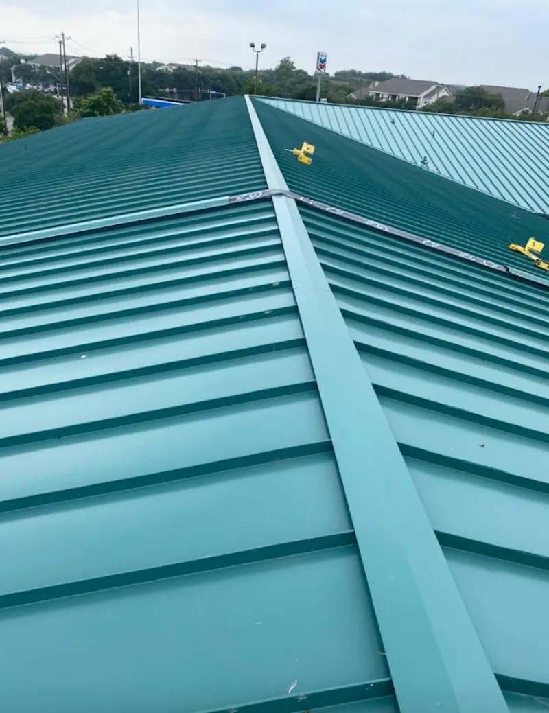 Green commercial metal roof ridge and valley for Metal Roof Repair in Carterville